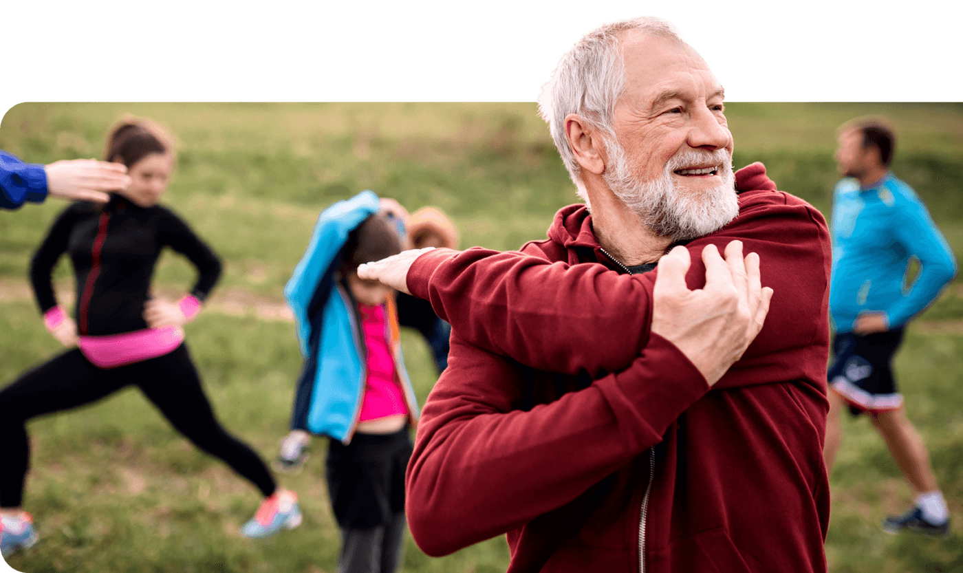Senior Stretching in the Park